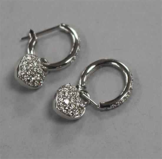 A modern pair of 18ct white gold and diamond set heart shaped drop earrings, with diamond set hoops, overall 21mm.